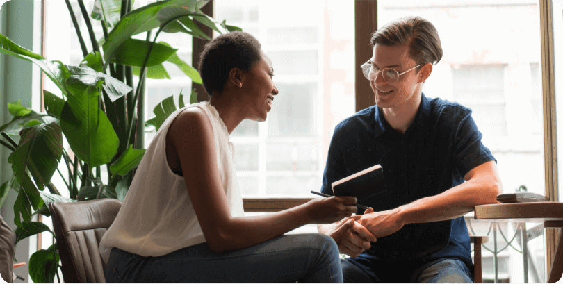 Connected professionals engaging in a productive conversation about intelligent assistant solutions.