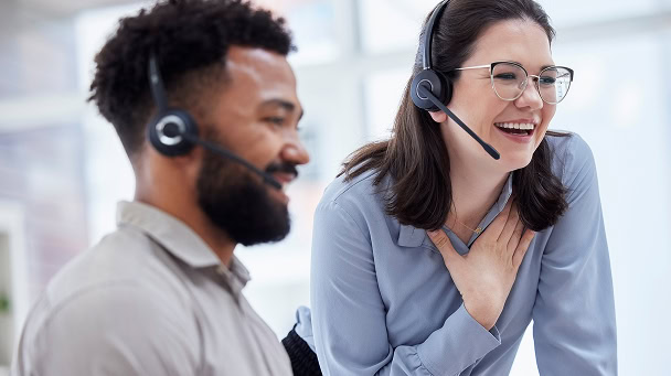 Customer support team using intelligent assistant for efficient service.